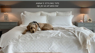 A stylish bedroom featuring Red Land Cotton linens, with soft textures and a refined aesthetic inspired by Anna’s personal taste