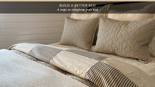 A luxurious, perfectly made bed with Red Land Cotton sheets, blankets, and pillows arranged neatly to create a welcoming sleep environment.