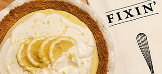 A beautifully plated slice of Joanna Gaines's lemon pie, with a golden crust and smooth, tangy filling, ready to enjoy after a homemade meal.